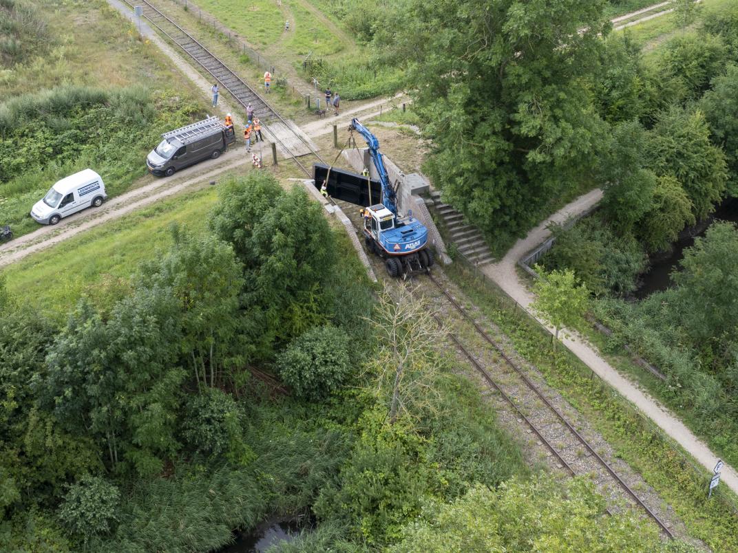Luchtfoto terugplaatsing zwarte deur