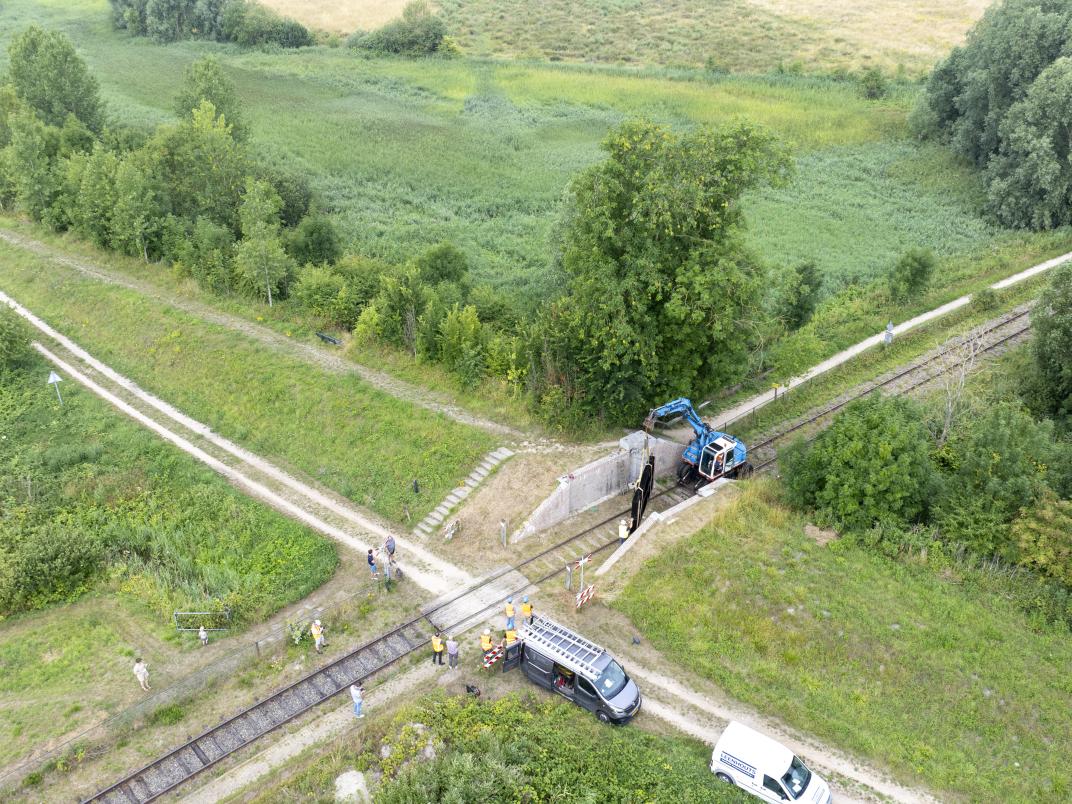 Luchtfoto terugplaatsing zwarte deur